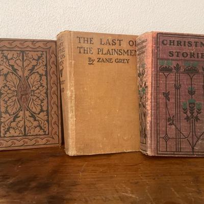 Amber glass ice box with vintage books