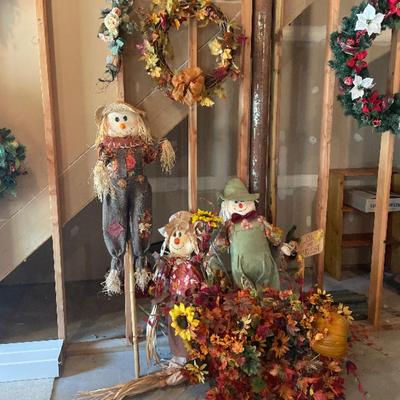Fall scarecrow and wreath decorations