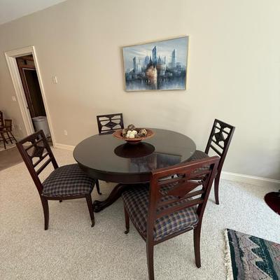 Solid wood round claw foot table and four chairs (includes glass top)