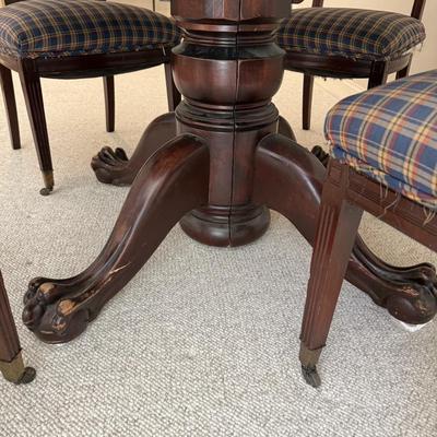 Solid wood round claw foot table and four chairs (includes glass top)