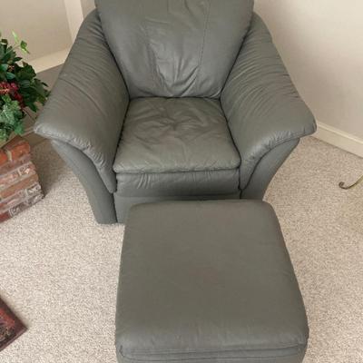 Modern gray leather chair and ottoman