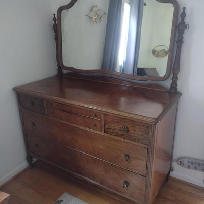 Antique Flame Mahogany Four Over Two Chest of Drawers with Swivel Mirror