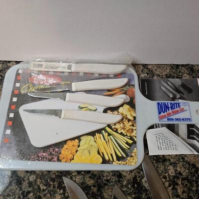 Knife & Sharpener Lot – Chef’s Choice Model 310 electric knife sharpener with some knives and a cutting board