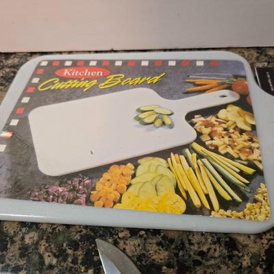 Knife & Sharpener Lot – Chef’s Choice Model 310 electric knife sharpener with some knives and a cutting board