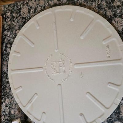 Assortment of The Pampered Chef kitchen items and Large Round Stone