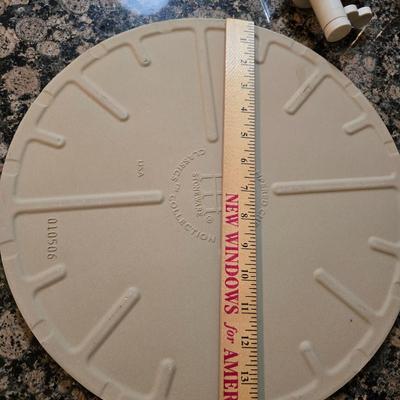 Assortment of The Pampered Chef kitchen items and Large Round Stone