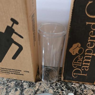 Assortment of The Pampered Chef kitchen items and Large Round Stone
