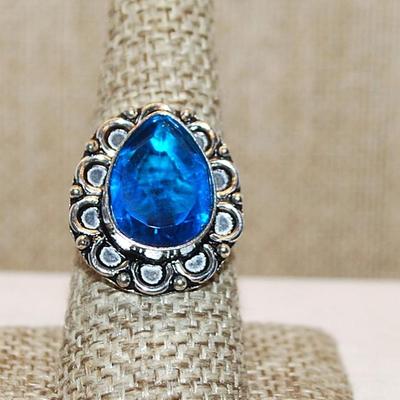 Size 9 BLUE Pear Shape Transparent Glass Rhinestone Ring with a FULL Loop Rim Setting on a Silver Tone Band (5.1g)