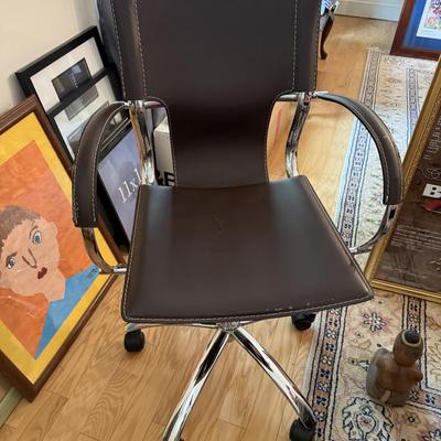 Cool dark brown leather and chrome office chair