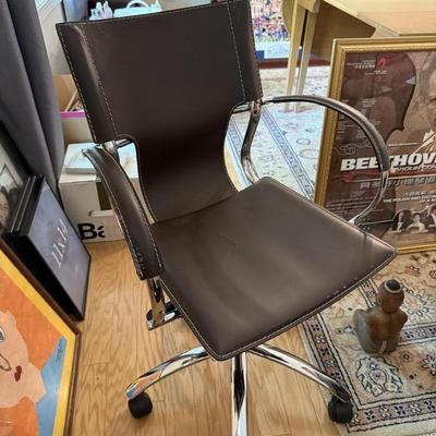 Cool dark brown leather and chrome office chair