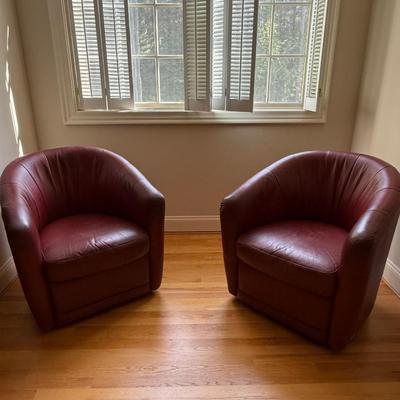 Red Natuzzi swivel chairs, retail for over $700 a chair!