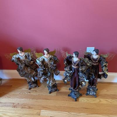 Four angel figurines