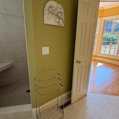 Towel rack and wall plaque