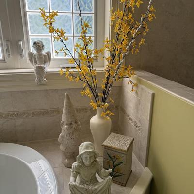 Decor including forsythia and gnome