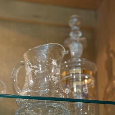 Lot of gorgeous etched glass pitchers, carafes, glassware and more