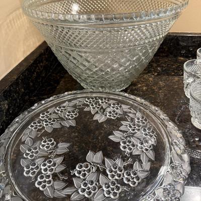 Punch bowl and mugs with pretty glass tray