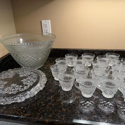 Punch bowl and mugs with pretty glass tray
