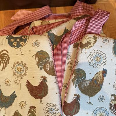 Four rooster seat cushions