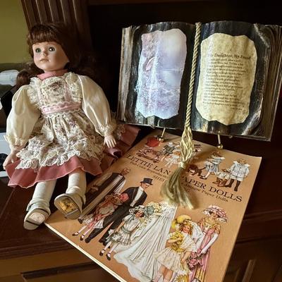 Two beautiful dolls and book