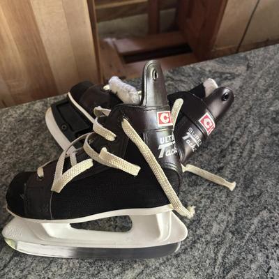 CCM children skates in sizes 6, 10, 11, and 12