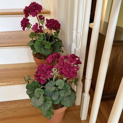 Three silk flower arrangements including tulips in a vase