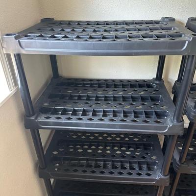 Two 4-Tier Plastic Shelving Units