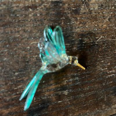 Sale Photo Thumbnail #23: Tiny glass hummingbird little over 2” has a gold like beak and chest area
