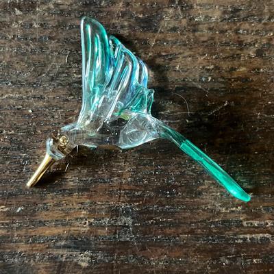 Sale Photo Thumbnail #22: Tiny glass hummingbird little over 2” has a gold like beak and chest area