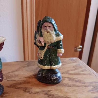3 CAST IRON DEPARTMENT 56 SANTAS AND A GIFT BOX