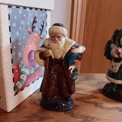 3 CAST IRON DEPARTMENT 56 SANTAS AND A GIFT BOX