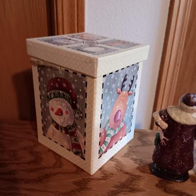 3 CAST IRON DEPARTMENT 56 SANTAS AND A GIFT BOX