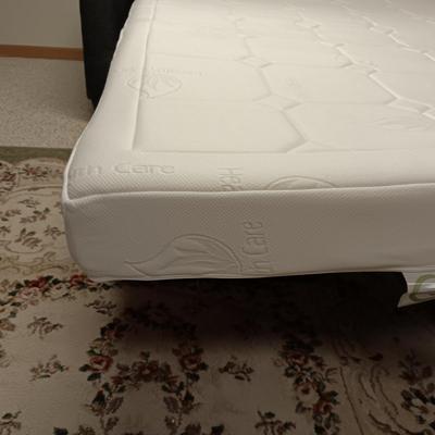 DARK GRAY, GENTLY USED, NEWER HIDE A BED SOFA WITH A TEMPURPEDIC STYLE MATTRESS