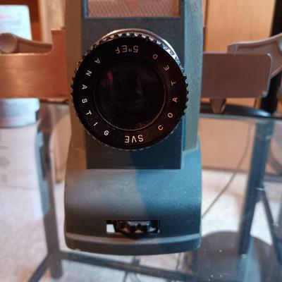 WORKING SKYLINE SLIDE PROJECTOR PLUS VINTAGE THREAD GUM, TIRE REPAIR KIT, AND CAR CHARGER