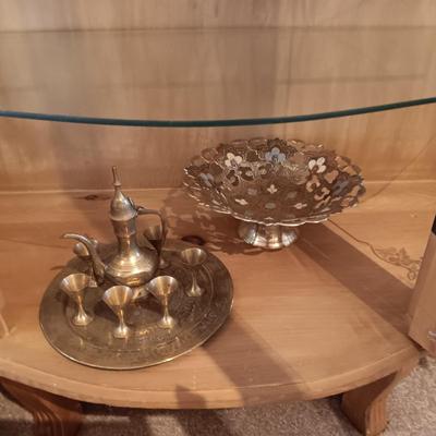 SMALLER BRASS DECANTER AND STEMMED CUPS ON A BRASS TRAY PLUS A COLORIZED BRASS BOWL