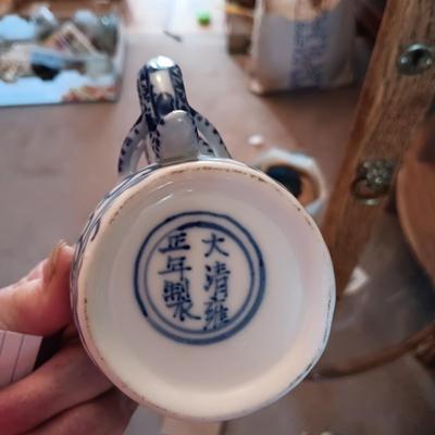 BLUE AND WHITE PLANTERS AND DISHES