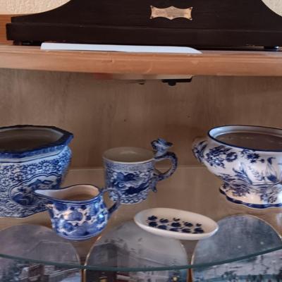 BLUE AND WHITE PLANTERS AND DISHES