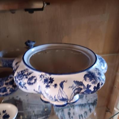 BLUE AND WHITE PLANTERS AND DISHES