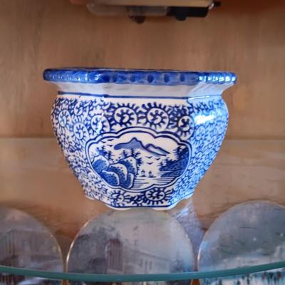 BLUE AND WHITE PLANTERS AND DISHES