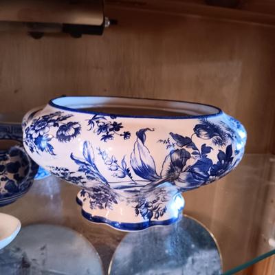 BLUE AND WHITE PLANTERS AND DISHES