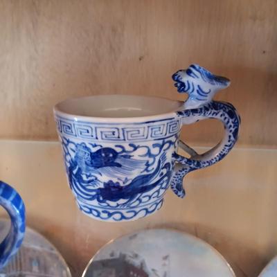 BLUE AND WHITE PLANTERS AND DISHES