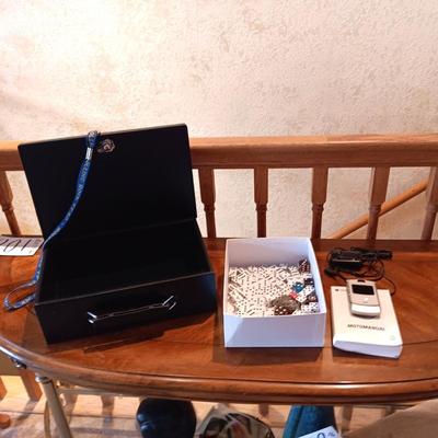 BRINKS LOCK BOX, MOTOROLA FLIP PHONE AND A BOX OF CASINO DICE