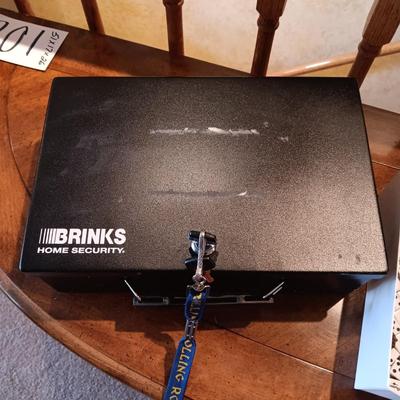 BRINKS LOCK BOX, MOTOROLA FLIP PHONE AND A BOX OF CASINO DICE