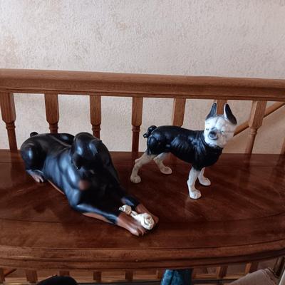 CAST IRON BOSTON TERRIER AND A DOBERMAN PINSCHER STATUE
