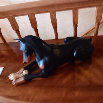 CAST IRON BOSTON TERRIER AND A DOBERMAN PINSCHER STATUE