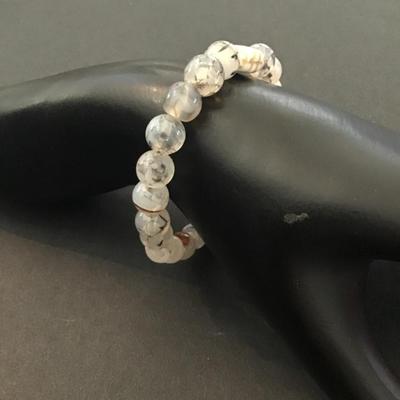 Stoned beaded stretch bracelet with carved elephant