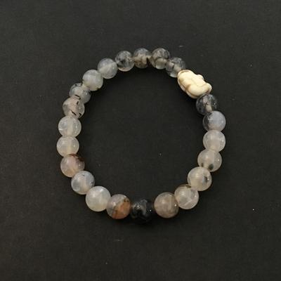 Stoned beaded stretch bracelet with carved elephant