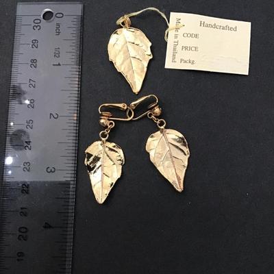 Vintage gold toned leaf earrings and matching pendant