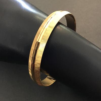 Vintage Monet, gold tone, bangle bracelet with diamond cut and brushed textures