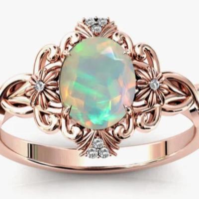 Oval Cut Ethiopian Opal & Rose Gold Art Deco Ring
