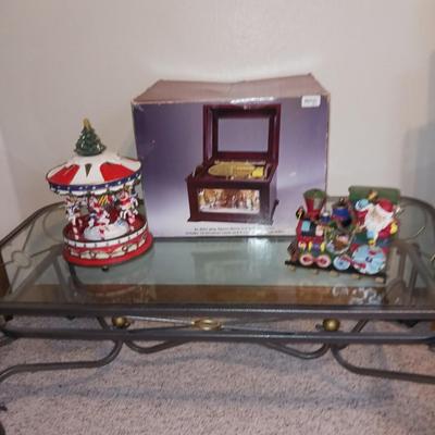 ANIMATED HOLIDAY SYMPHONY, MUSICAL CAROUSEL AND A SANTA IN A TRAIN